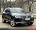 Чорний Фольксваген Туарег, об'ємом двигуна 3 л та пробігом 212 тис. км за 30500 $, фото 1 на Automoto.ua