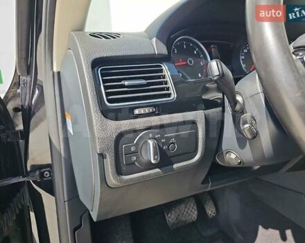 Черный Фольксваген Туарег, объемом двигателя 3 л и пробегом 250 тыс. км за 29500 $, фото 1 на Automoto.ua