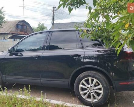 Чорний Фольксваген Туарег, об'ємом двигуна 2.97 л та пробігом 301 тис. км за 24800 $, фото 1 на Automoto.ua