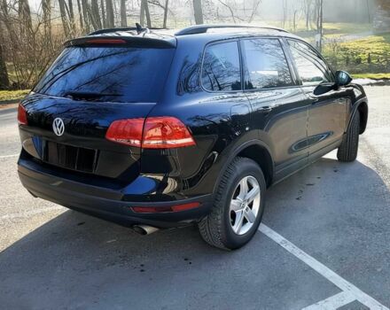 Черный Фольксваген Туарег, объемом двигателя 3 л и пробегом 76 тыс. км за 9300 $, фото 4 на Automoto.ua