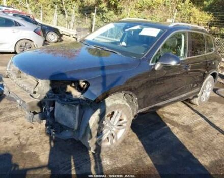 Черный Фольксваген Туарег, объемом двигателя 3 л и пробегом 170 тыс. км за 3000 $, фото 1 на Automoto.ua