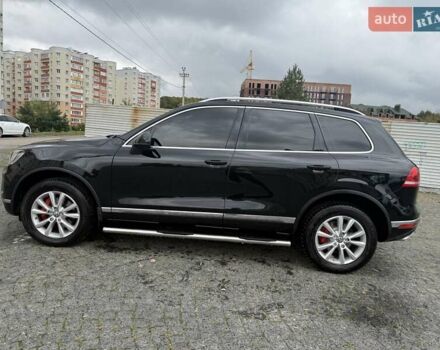 Черный Фольксваген Туарег, объемом двигателя 3 л и пробегом 224 тыс. км за 27000 $, фото 1 на Automoto.ua