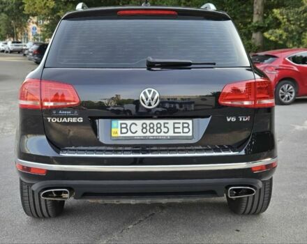 Черный Фольксваген Туарег, объемом двигателя 3 л и пробегом 253 тыс. км за 25000 $, фото 2 на Automoto.ua