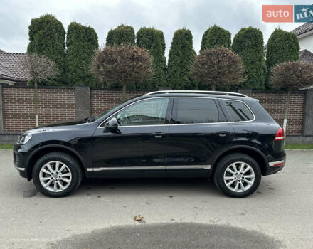 Чорний Фольксваген Туарег, об'ємом двигуна 3 л та пробігом 218 тис. км за 26800 $, фото 2 на Automoto.ua