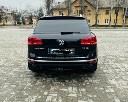 Чорний Фольксваген Туарег, об'ємом двигуна 3 л та пробігом 256 тис. км за 30500 $, фото 1 на Automoto.ua