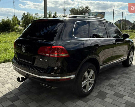 Черный Фольксваген Туарег, объемом двигателя 3 л и пробегом 210 тыс. км за 25000 $, фото 4 на Automoto.ua