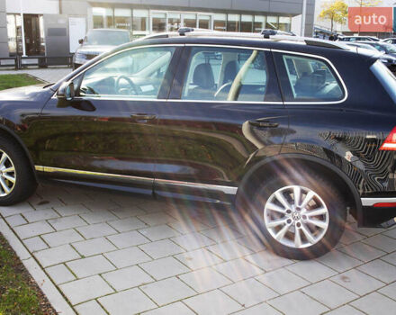 Чорний Фольксваген Туарег, об'ємом двигуна 3 л та пробігом 106 тис. км за 32519 $, фото 3 на Automoto.ua