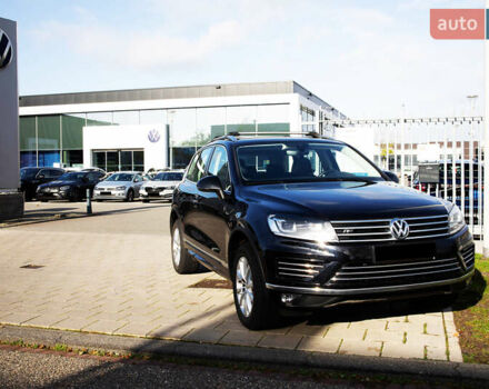 Чорний Фольксваген Туарег, об'ємом двигуна 3 л та пробігом 106 тис. км за 32519 $, фото 2 на Automoto.ua
