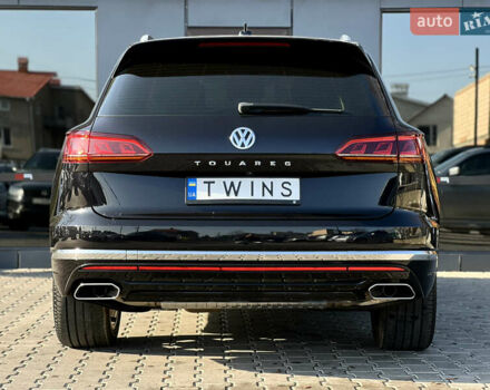 Чорний Фольксваген Туарег, об'ємом двигуна 3 л та пробігом 166 тис. км за 49900 $, фото 4 на Automoto.ua