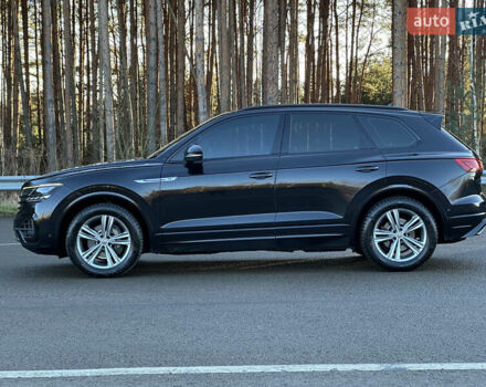 Черный Фольксваген Туарег, объемом двигателя 3 л и пробегом 259 тыс. км за 38999 $, фото 2 на Automoto.ua