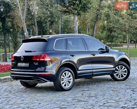 Черный Фольксваген Туарег, объемом двигателя 2.97 л и пробегом 275 тыс. км за 24800 $, фото 1 на Automoto.ua