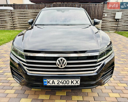 Черный Фольксваген Туарег, объемом двигателя 3 л и пробегом 195 тыс. км за 33700 $, фото 1 на Automoto.ua