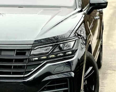 Черный Фольксваген Туарег, объемом двигателя 3 л и пробегом 115 тыс. км за 45500 $, фото 1 на Automoto.ua