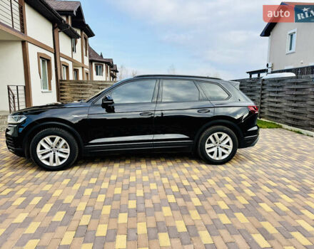 Черный Фольксваген Туарег, объемом двигателя 3 л и пробегом 195 тыс. км за 33700 $, фото 6 на Automoto.ua