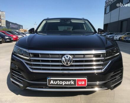 Чорний Фольксваген Туарег, об'ємом двигуна 3 л та пробігом 119 тис. км за 49990 $, фото 1 на Automoto.ua