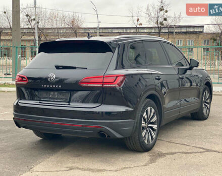 Черный Фольксваген Туарег, объемом двигателя 2.99 л и пробегом 180 тыс. км за 31700 $, фото 2 на Automoto.ua