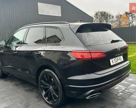 Чорний Фольксваген Туарег, об'ємом двигуна 3 л та пробігом 145 тис. км за 49990 $, фото 2 на Automoto.ua