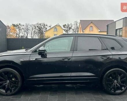 Чорний Фольксваген Туарег, об'ємом двигуна 3 л та пробігом 145 тис. км за 49990 $, фото 1 на Automoto.ua