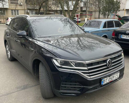 Черный Фольксваген Туарег, объемом двигателя 2.97 л и пробегом 208 тыс. км за 42000 $, фото 1 на Automoto.ua