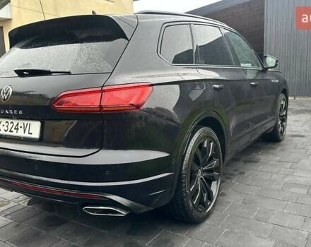 Чорний Фольксваген Туарег, об'ємом двигуна 3 л та пробігом 145 тис. км за 49990 $, фото 4 на Automoto.ua