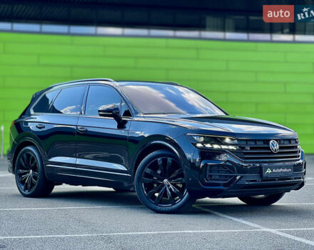 Черный Фольксваген Туарег, объемом двигателя 3 л и пробегом 171 тыс. км за 51999 $, фото 1 на Automoto.ua