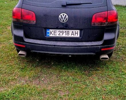 Черный Фольксваген Туарег, объемом двигателя 3.2 л и пробегом 204 тыс. км за 7400 $, фото 1 на Automoto.ua