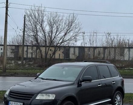 Черный Фольксваген Туарег, объемом двигателя 4.2 л и пробегом 343 тыс. км за 5500 $, фото 1 на Automoto.ua