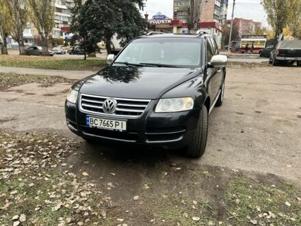 Черный Фольксваген Туарег, объемом двигателя 3.2 л и пробегом 340 тыс. км за 7000 $, фото 1 на Automoto.ua