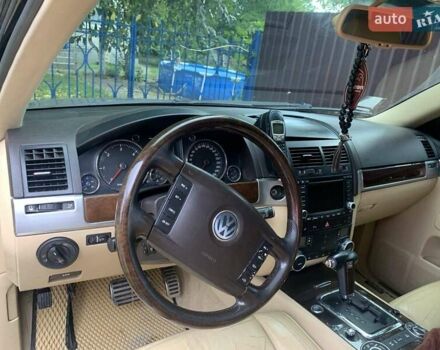 Черный Фольксваген Туарег, объемом двигателя 4.92 л и пробегом 354 тыс. км за 7000 $, фото 1 на Automoto.ua