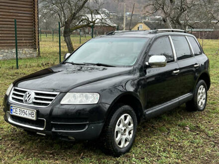 Черный Фольксваген Туарег, объемом двигателя 3.19 л и пробегом 260 тыс. км за 5300 $, фото 1 на Automoto.ua