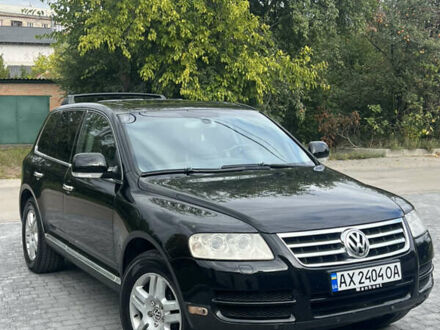 Черный Фольксваген Туарег, объемом двигателя 3.2 л и пробегом 228 тыс. км за 7800 $, фото 1 на Automoto.ua