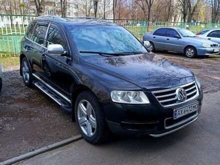 Черный Фольксваген Туарег, объемом двигателя 4.2 л и пробегом 0 тыс. км за 8000 $, фото 1 на Automoto.ua