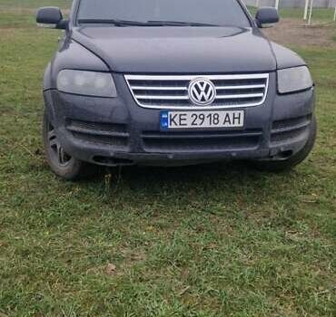 Черный Фольксваген Туарег, объемом двигателя 3.2 л и пробегом 204 тыс. км за 7400 $, фото 1 на Automoto.ua