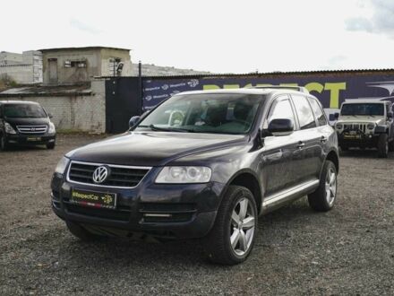 Черный Фольксваген Туарег, объемом двигателя 2.5 л и пробегом 395 тыс. км за 4100 $, фото 1 на Automoto.ua