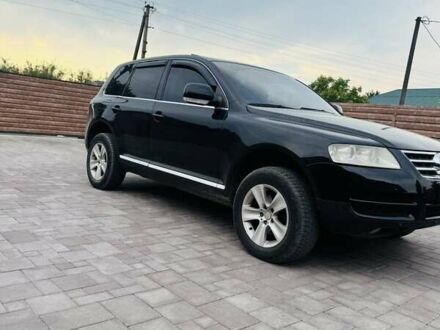 Черный Фольксваген Туарег, объемом двигателя 2.46 л и пробегом 330 тыс. км за 7900 $, фото 1 на Automoto.ua