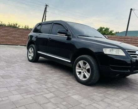 Черный Фольксваген Туарег, объемом двигателя 2.46 л и пробегом 330 тыс. км за 7900 $, фото 1 на Automoto.ua