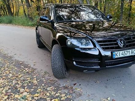 Черный Фольксваген Туарег, объемом двигателя 3.2 л и пробегом 210 тыс. км за 8700 $, фото 1 на Automoto.ua
