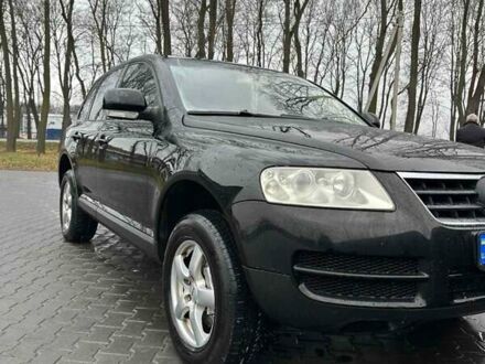 Чорний Фольксваген Туарег, об'ємом двигуна 3.2 л та пробігом 290 тис. км за 6900 $, фото 1 на Automoto.ua