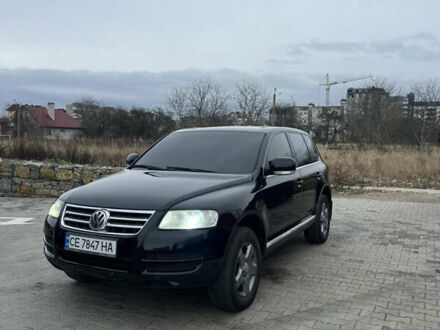 Черный Фольксваген Туарег, объемом двигателя 2.46 л и пробегом 426 тыс. км за 7400 $, фото 1 на Automoto.ua