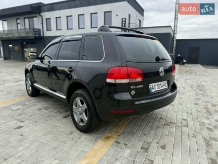 Чорний Фольксваген Туарег, об'ємом двигуна 2.5 л та пробігом 260 тис. км за 8000 $, фото 1 на Automoto.ua