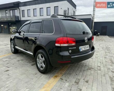 Чорний Фольксваген Туарег, об'ємом двигуна 2.5 л та пробігом 260 тис. км за 8000 $, фото 1 на Automoto.ua