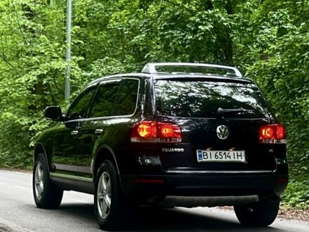 Фольксваген Туарег 2004 в Харькове на Automoto.ua Черный Фольксваген Туарег, объемом двигателя 3.2 л и пробегом 344 тыс. км за 7990 $, фото 1 на Automoto.ua