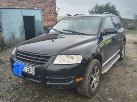 Черный Фольксваген Туарег, объемом двигателя 3.2 л и пробегом 999 тыс. км за 3550 $, фото 1 на Automoto.ua