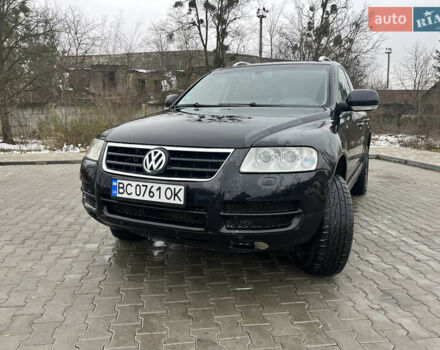 Черный Фольксваген Туарег, объемом двигателя 2.46 л и пробегом 221 тыс. км за 6700 $, фото 1 на Automoto.ua