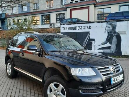 Фольксваген Туарег 2004 у Рівному на Automoto.ua Чорний Фольксваген Туарег, об'ємом двигуна 2.46 л та пробігом 255 тис. км за 10300 $, фото 1 на Automoto.ua