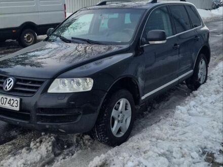 Черный Фольксваген Туарег, объемом двигателя 2.5 л и пробегом 111 тыс. км за 4600 $, фото 1 на Automoto.ua