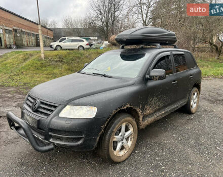 Черный Фольксваген Туарег, объемом двигателя 3 л и пробегом 496 тыс. км за 4200 $, фото 1 на Automoto.ua