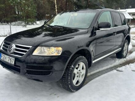 Черный Фольксваген Туарег, объемом двигателя 3 л и пробегом 345 тыс. км за 5520 $, фото 1 на Automoto.ua