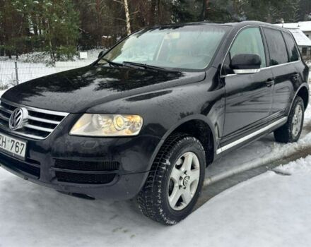 Чорний Фольксваген Туарег, об'ємом двигуна 3 л та пробігом 345 тис. км за 5520 $, фото 1 на Automoto.ua