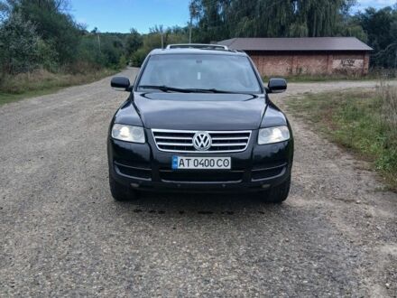 Черный Фольксваген Туарег, объемом двигателя 3 л и пробегом 408 тыс. км за 10500 $, фото 1 на Automoto.ua